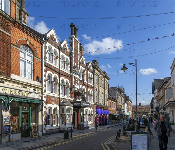 Historic buildings the Kings Arms Hotel and shops in Wood Street, Old Town, Swindon, Wiltshire,