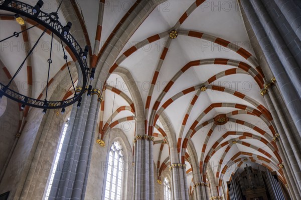 The Divi Blasii Church is a three-nave, cruciform hall church on the Untermarkt square in the town