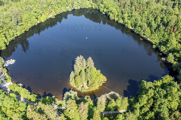 Lake Bergsee ('mountain lake') near Bad Säckingen, island in the lake, boat dock of rental boats,