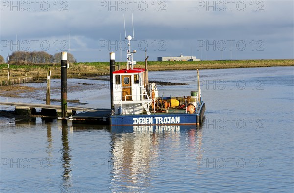 Deben Trojan multicat workboat boat, River Ore, Orford, Suffolk, England, UK