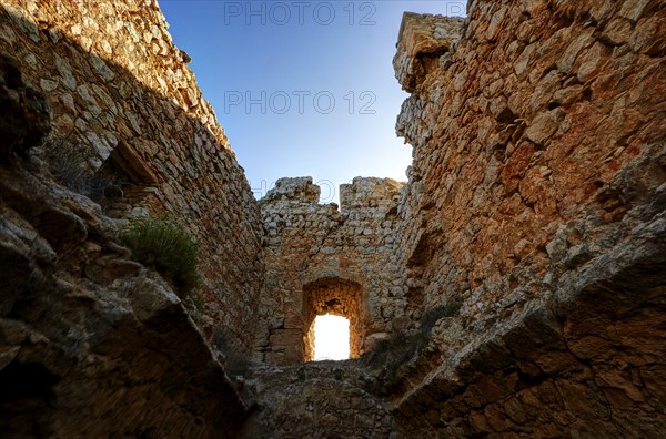 HDR, Interior view of the castle wall with a window-like hole through which sunlight enters,