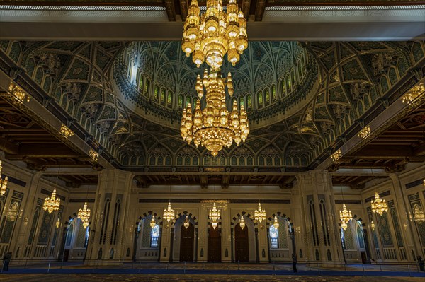 Interior, dome and illuminated chandelier in the Sultan Qaboos Mosque, Muscat, Arabian Peninsula,