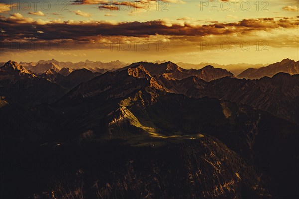 Thaneller summit at sunset in the Lechtal valley in Tyrol with a wonderful view of the surrounding