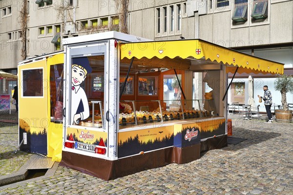 Freiburg, Germany, April 2022: Food truck called 'Stefan's Käsekuchen' selling traditional German