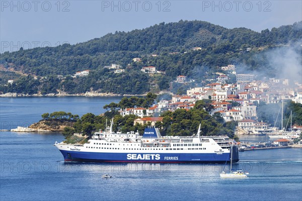 Seajets ferry and boats in the sea off the Mediterranean island of Skiathos, Greece, Europe