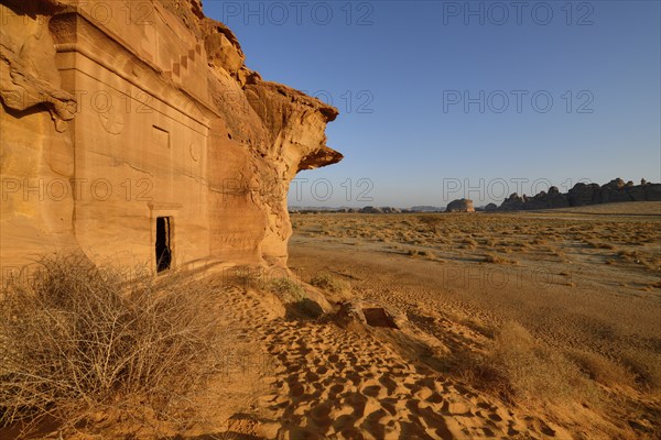Nabataean tomb at Djabal Al-Ahmar in first daylight, Hegra or Mada'in Salih, AlUla region, Medina