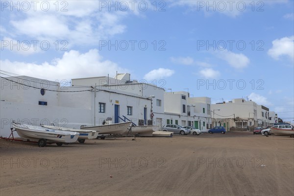 Village street in Caleta de Famara, municipality of Teguise, Lanzarote, Canary Island, Canary