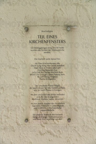 Information board, part of a church window, historical and partly destroyed church window,