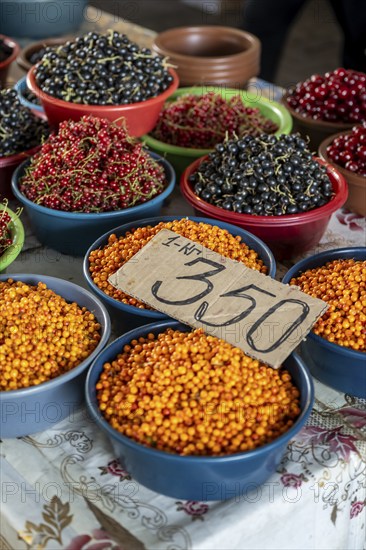 Berries for sale, market stall at the Osh Bazaar, Bishkek, Kyrgyzstan, Asia