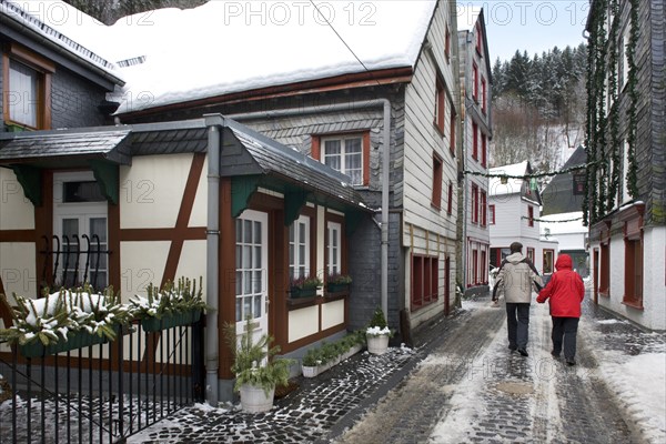 Tourists in the historic centre of Monschau an der Rur, Eifel, North Rhine-Westphalia, Germany,