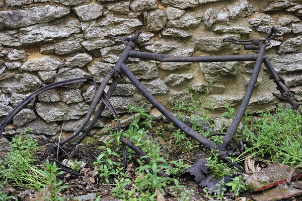 Remains of a burnt bicycle. The burnt village of Oradour-sur-Glane was destroyed on 10 June 1944