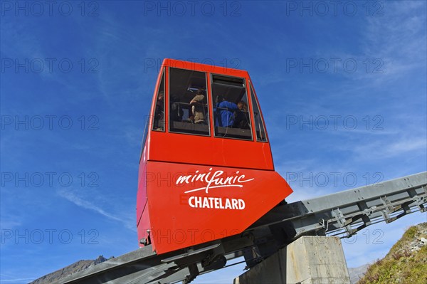 Red carriage of the funicular Minifunic at Châtelard amusement park, Parc d'Attractions du