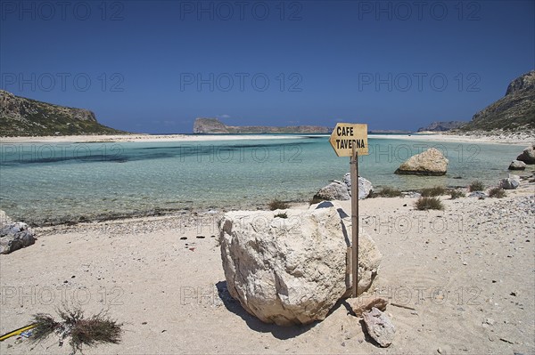 Beach, lagoon, Gramvoussa Island, sign Cafe Taverna, blue cloudless sky, Gramvoussa Peninsula,