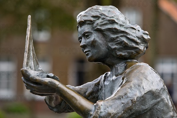 Sculpture Caroline cradles a ship in safety, artist Peters u. Petersen, Carolinensiel, East Frisia,