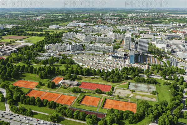 Aerial view of Munich Olympic village and tennis couts from Olympiaturm (Olympic Tower) . Munich,