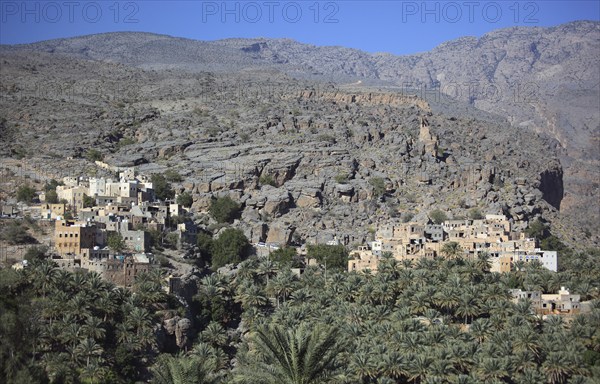 Al-Hamra is one of the many interesting oases with an old mud part with red houses on stone