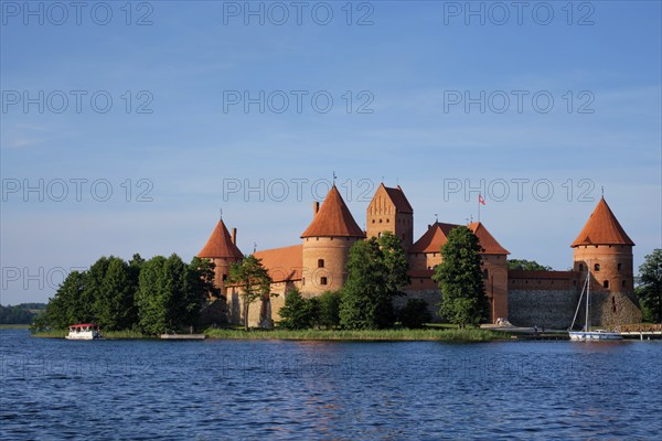 Trakai Island Castle in lake Galve with boats in summer day, Lithuania. Trakai Castle is one of