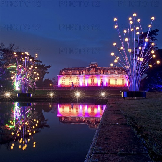 Illuminated Benrath Palace in the evening with the mirror pond at Christmas Wunderwelt, Düsseldorf,