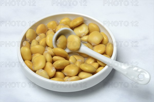 Lupine (Lupinus), pickled lupine seed in small bowls