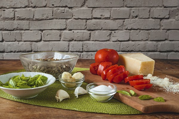 Food photography, making tomato pesto, with tomatoes (Solanum lycopersicum), salt, sunflower
