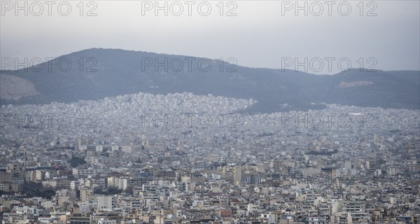View over the sea of houses of Athens, Athens, Attica, Greece, Europe