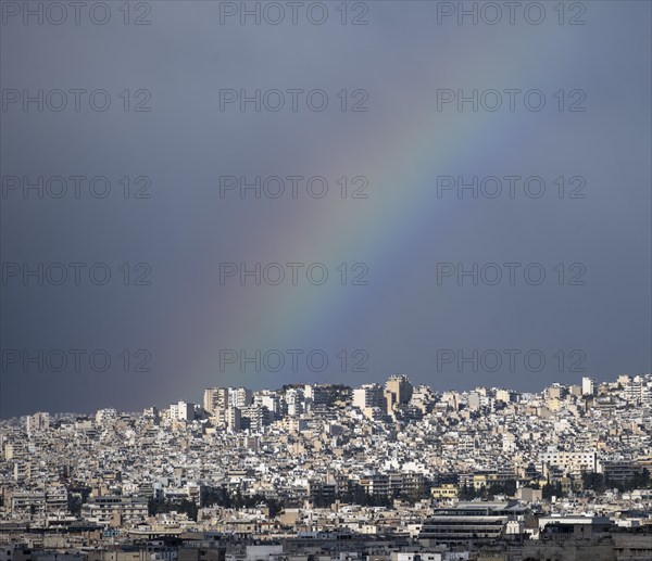 View over the sea of houses of Athens, with rainbow, Athens, Attica, Greece, Europe