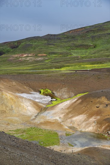 Volcanic landscape with colourful hills, Krafla geothermal area, Northern Iceland, Iceland, Europe