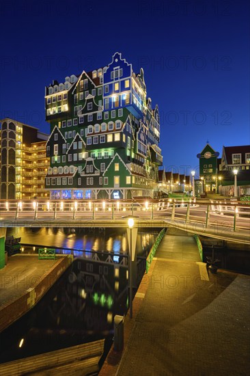 ZAANDAM, NETHERLANDS, MAY 8, 2017: Inntel Hotel in Zaandam illuminated at night. Design of