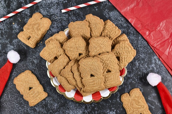 Speculaas or speculoos, a spiced thin, crunchy and caramelized and shortcrust biscuit with figure