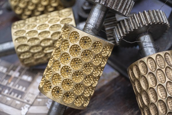 Profiled metal rollers, machine parts, embossing rollers, brass matrices for the production of
