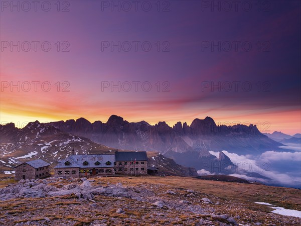 Schlernhaus at dawn, behind rose garden, Dolomites, Schlern, South Tyrol, Italy, Europe