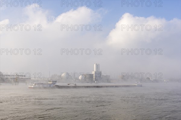 BASF plant site on the banks of the Rhine, chemical company, cargo ship, foggy mood, Ludwigshafen,