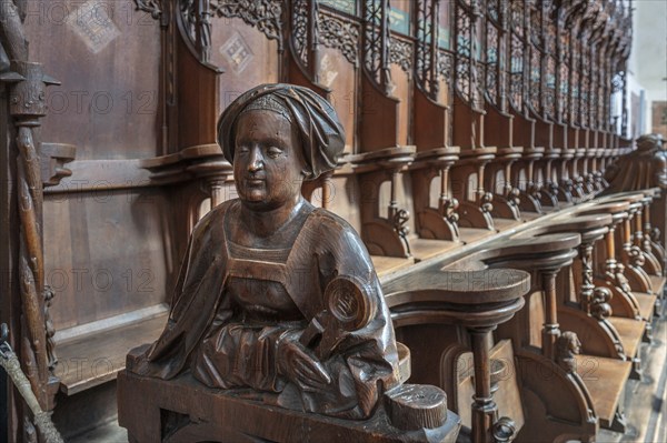 Figure on the late Gothic choir stalls from 1507, St Martin, Memmingen, Bavaria, Germany, Europe