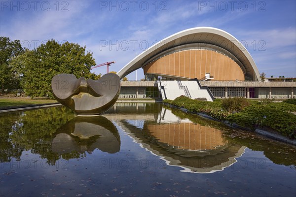 House of World Cultures with sculpture Butterfly by Henry Moore and reflection on the water surface
