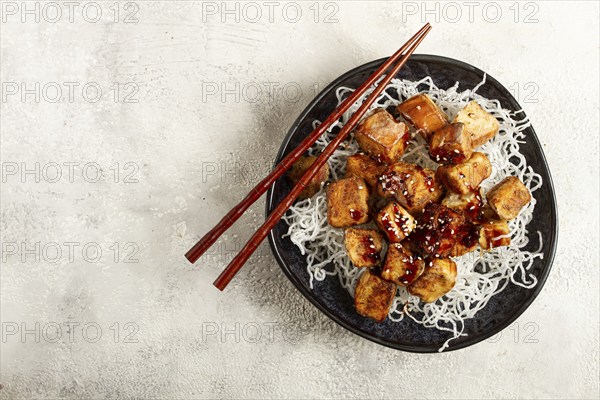 Fried eggplant, with funchosa noodles, with teriyaki sauce and sesame seeds, homemade, no people