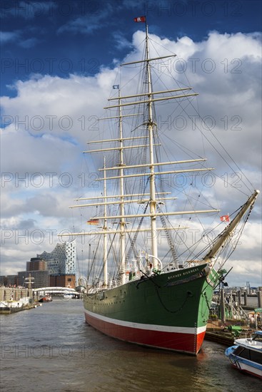 St. Pauli Landungsbrücken with sailing ship and Elbe, Elbe Philharmonic Hall in the background,