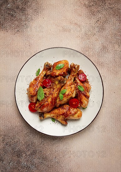 Fried chicken legs, in soy sauce, spices, herbs, top view, homemade
