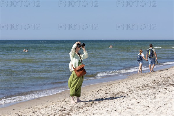 Elderly woman photographed on the beach, Darßer Ort, Born a. Darß, Mecklenburg-Vorpommern, Germany,
