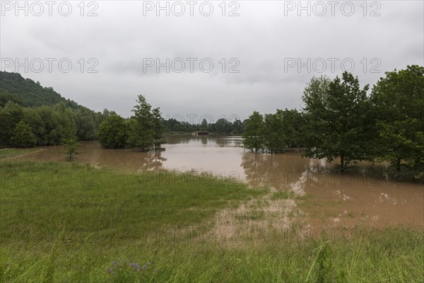 Symbolic image Extreme weather, global warming, high climate change, water retention basin, flood