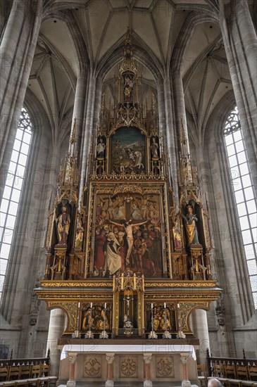 High altar, completed in 1642, replaced by neo-Gothic carvings in 1856, late Gothic hall church of