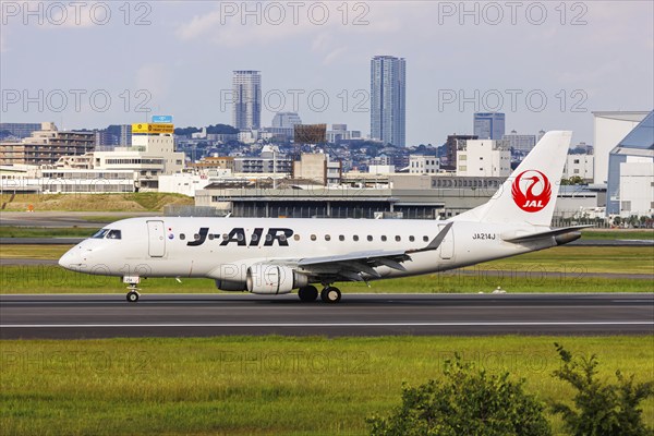 J-Air Embraer 170 aircraft with registration number JA214J at Itami Airport (ITM) in Osaka, Japan,