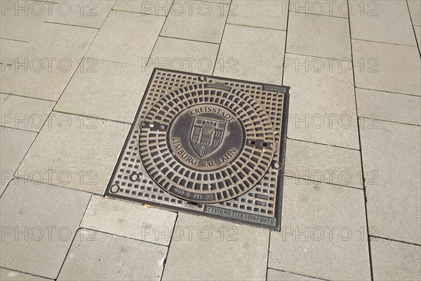 Manhole cover with city coat of arms and inscription County town Limburg a. d. Lahn, Europaplatz,