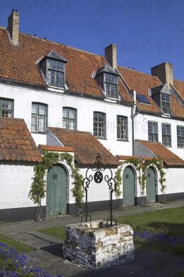 White houses of beguines at the beguinage of Diksmuide, Dixmude, West Flanders, Belgium, Europe
