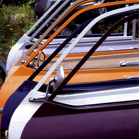 Old car doors lined up