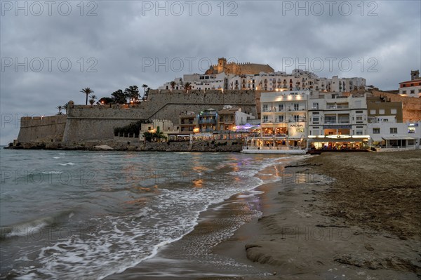 Old town with the Romanesque castle from the 14th century, blue hour, Peñíscola, province