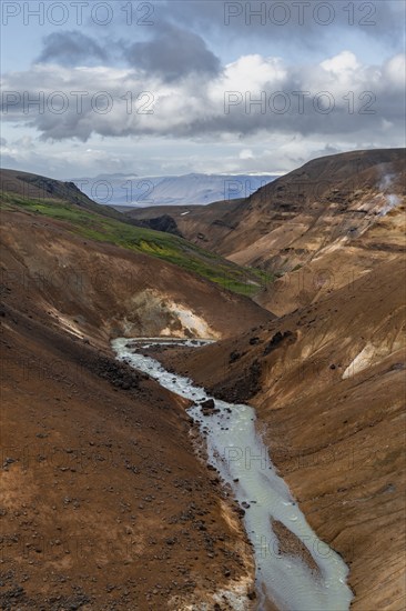 Stream between colourful rhyolite mountains, Hveradalir geothermal area, Kerlingarfjöll, Icelandic