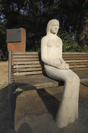 Sculpture Snow White on the Park Bench by Bettina Seitz 2015 in Lohr am Main, Lower Franconia,