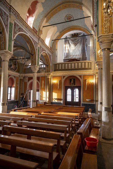 Interior view of the Basilica of San Giorgio in Ano Syros, nave with pews and organ, Ano Syros,
