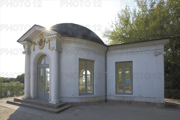 Classicist breakfast pavilion in the castle garden during backlighting, pavilion, Aschaffenburg,