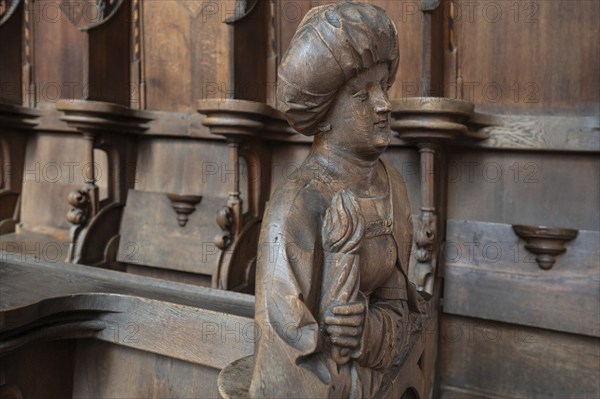 Figure on the late Gothic choir stalls from 1507, St Martin, Memmingen, Bavaria, Germany, Europe